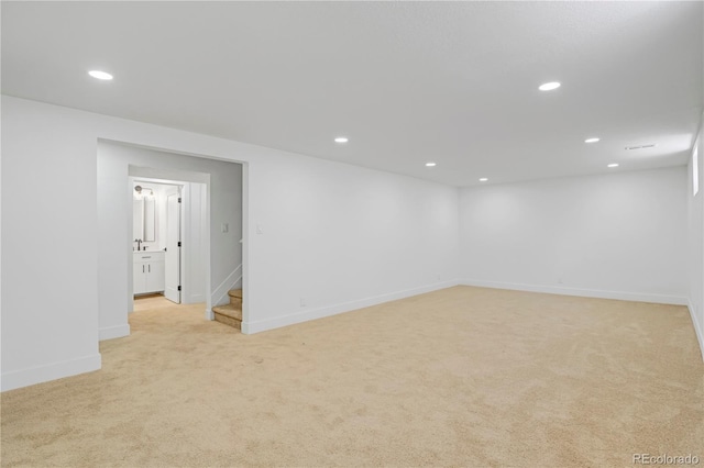 3055 S Winona Ct, Denver, CO 80236 - empty room featuring light carpet, recessed lighting, and stairway