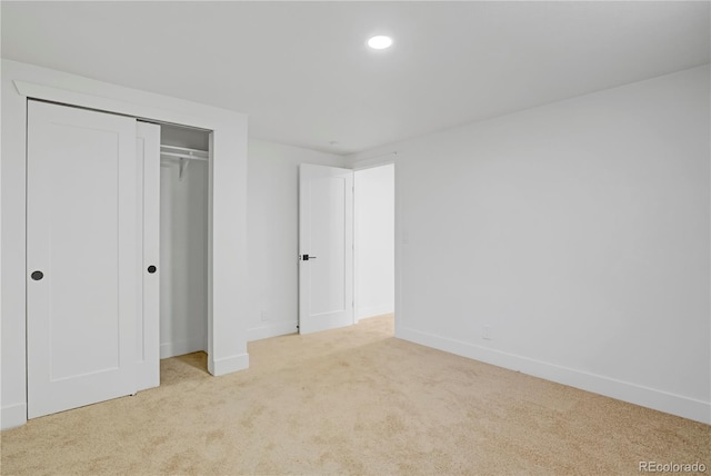 3055 S Winona Ct, Denver, CO 80236 - unfurnished bedroom featuring carpet flooring, a closet, and recessed lighting