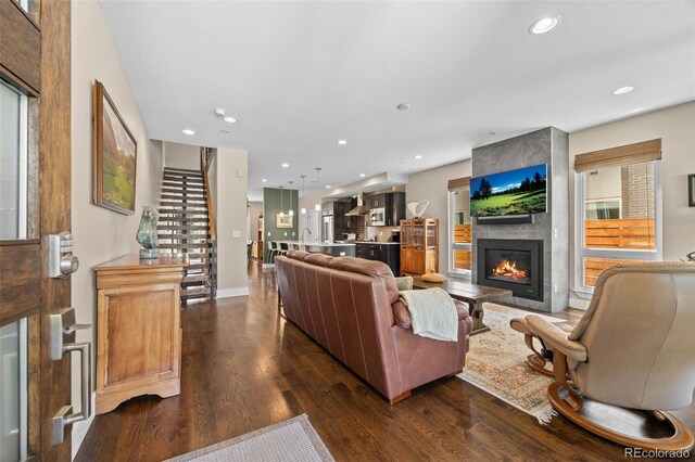 2730 Hooker St, Denver, CO 80211 - living room with stairway, dark wood-type flooring, a fireplace, and recessed lighting