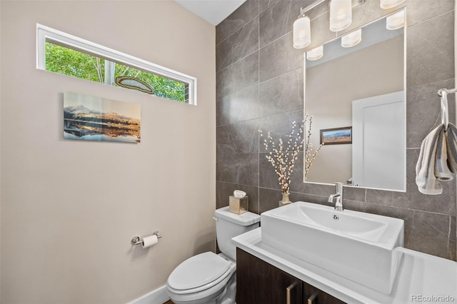 2730 Hooker St, Denver, CO 80211 - half bath with tile walls, plenty of natural light, and vanity