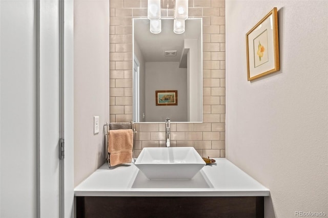 2730 Hooker St, Denver, CO 80211 - bathroom featuring tasteful backsplash and vanity