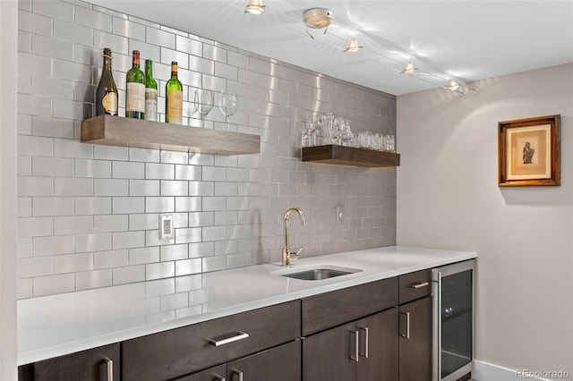 2730 Hooker St, Denver, CO 80211 - kitchen with open shelves, beverage cooler, decorative backsplash, dark brown cabinets, and light countertops