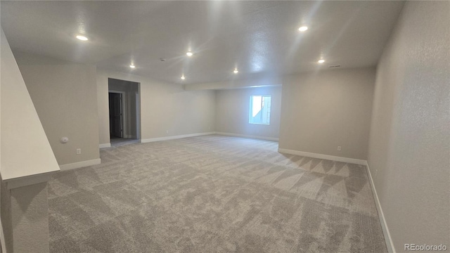 16554 W 93rd Way, Arvada, CO 80007 - spare room with light colored carpet and recessed lighting