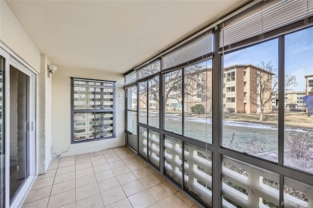 unfurnished sunroom with a wealth of natural light