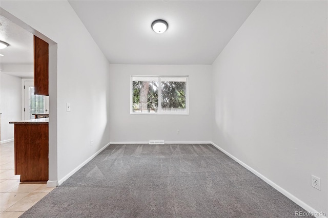 2495 S Lansing Way, Aurora, CO 80014 - unfurnished room featuring healthy amount of natural light, baseboards, and carpet floors