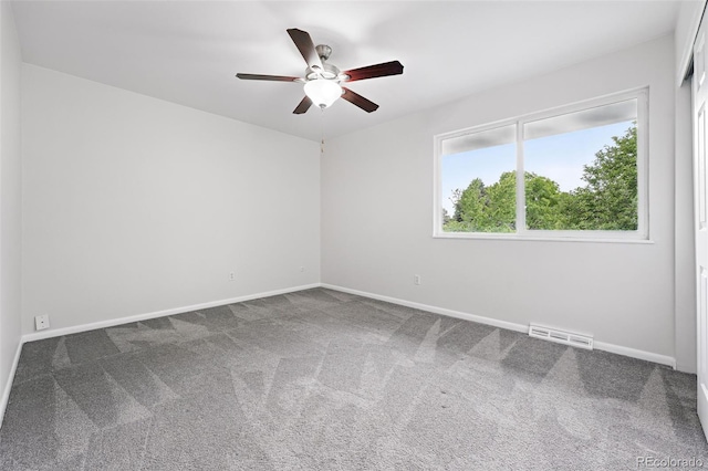 2495 S Lansing Way, Aurora, CO 80014 - spare room featuring ceiling fan, baseboards, and carpet