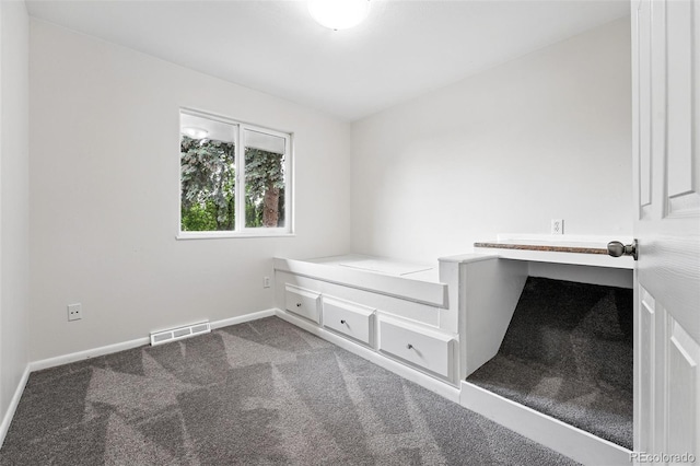 2495 S Lansing Way, Aurora, CO 80014 - unfurnished bedroom featuring dark colored carpet and baseboards