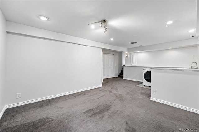 2495 S Lansing Way, Aurora, CO 80014 - finished below grade area featuring carpet, baseboards, washer / dryer, stairs, and recessed lighting