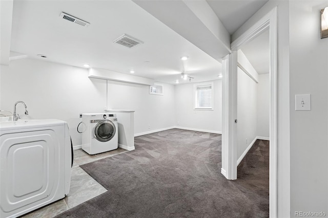 2495 S Lansing Way, Aurora, CO 80014 - laundry area with washing machine and dryer, carpet flooring, baseboards, and recessed lighting