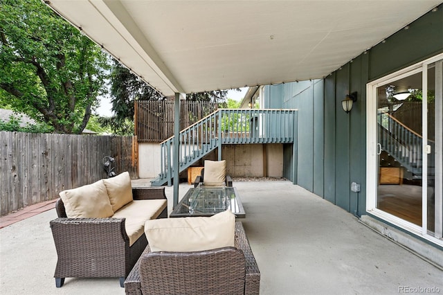 2495 S Lansing Way, Aurora, CO 80014 - fenced backyard with stairway, a patio, and outdoor lounge area