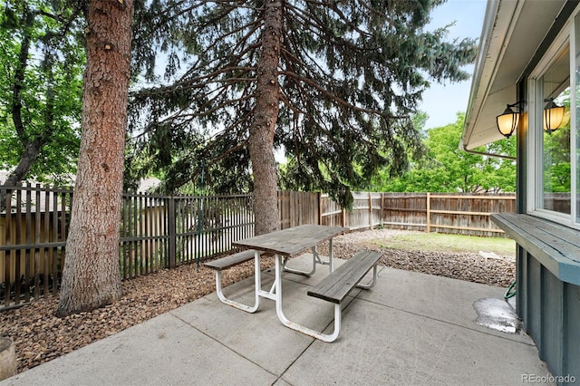 2495 S Lansing Way, Aurora, CO 80014 - fenced backyard with a patio