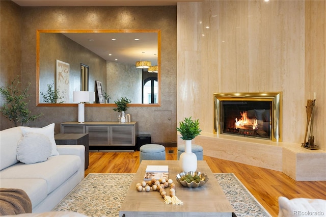 9 Sedgwick Dr, Englewood, CO 80113 - living area featuring wood finished floors and a glass covered fireplace
