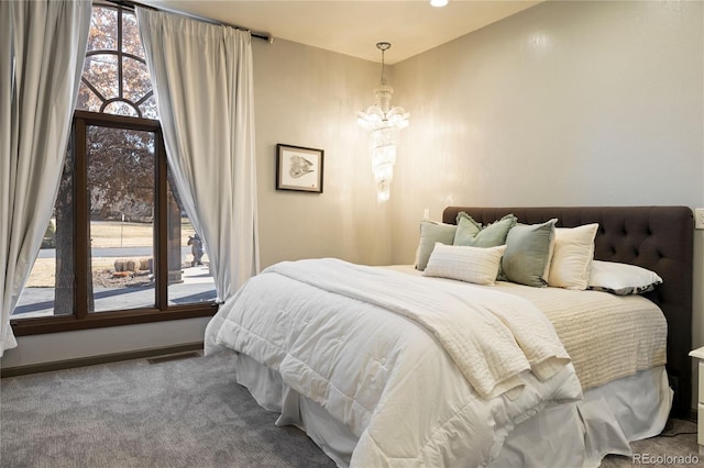 9 Sedgwick Dr, Englewood, CO 80113 - bedroom featuring a chandelier and carpet