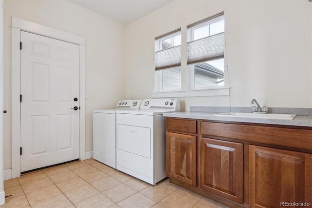 5605 Killen Ave, Castle Rock, CO 80104 - laundry area featuring washer and dryer and light tile patterned flooring
