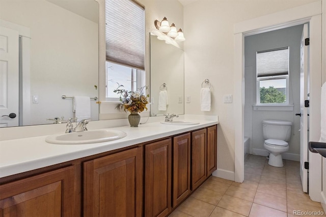 5605 Killen Ave, Castle Rock, CO 80104 - bathroom featuring double vanity and tile patterned floors