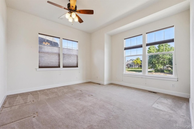 5605 Killen Ave, Castle Rock, CO 80104 - unfurnished room featuring plenty of natural light, carpet floors, and a ceiling fan