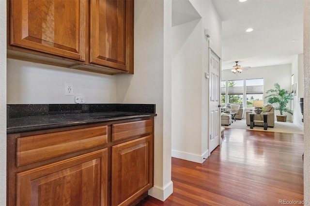 5605 Killen Ave, Castle Rock, CO 80104 - bar area with dark wood-style floors, recessed lighting, and ceiling fan