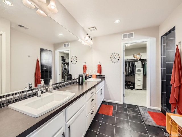 bathroom featuring vanity and tile patterned flooring