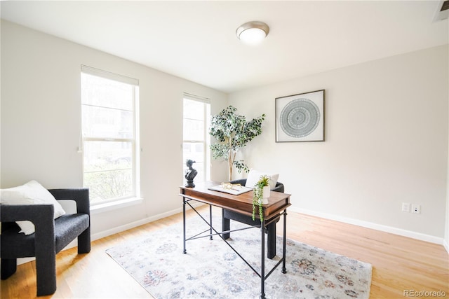 451 S Reed St, Lakewood, CO 80226 - office space featuring light wood finished floors, healthy amount of natural light, and baseboards