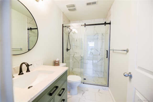 451 S Reed St, Lakewood, CO 80226 - full bath with toilet, vanity, a marble finish shower, and marble finish flooring