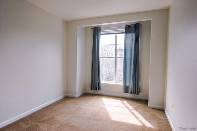 451 S Reed St, Lakewood, CO 80226 - empty room with carpet, plenty of natural light, and baseboards