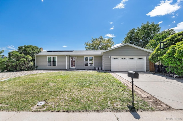 4844 E 110th Pl, Thornton, CO 80233 - single story home featuring concrete driveway, an attached garage, solar panels, and a front yard