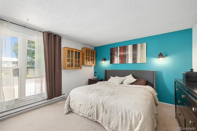 4844 E 110th Pl, Thornton, CO 80233 - carpeted bedroom featuring baseboard heating and a textured ceiling