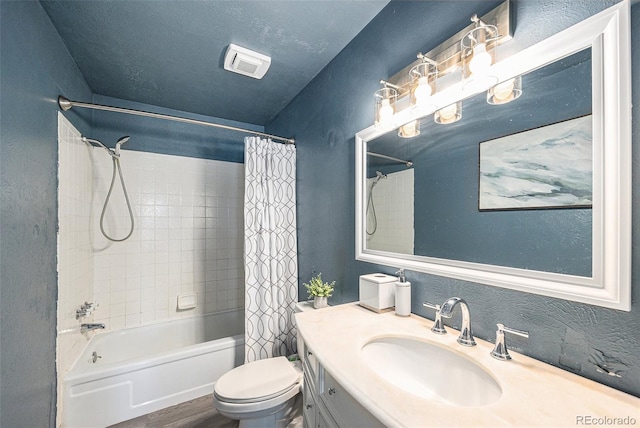 4844 E 110th Pl, Thornton, CO 80233 - full bathroom with shower / bath combo with shower curtain, vanity, a textured wall, and wood finished floors