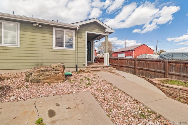 rear view of house featuring a patio