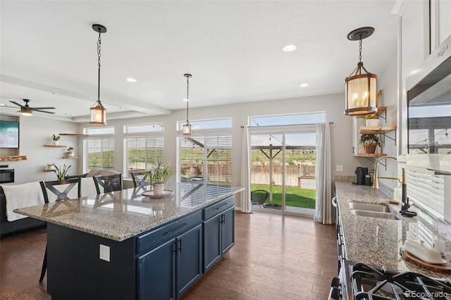 18079 E 108th Pl, Commerce City, CO 80022 - kitchen featuring a sink, plenty of natural light, ceiling fan, dark wood-style floors, and recessed lighting