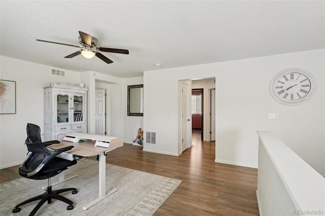 18079 E 108th Pl, Commerce City, CO 80022 - office area featuring wood finished floors, ceiling fan, and baseboards