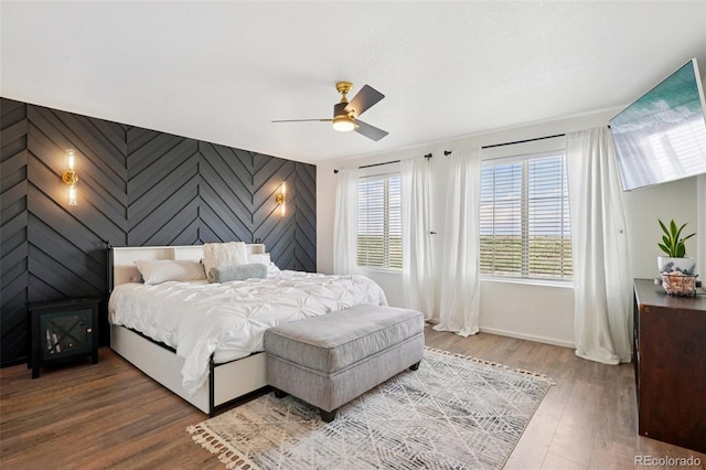 18079 E 108th Pl, Commerce City, CO 80022 - bedroom with wood finished floors, baseboards, and ceiling fan