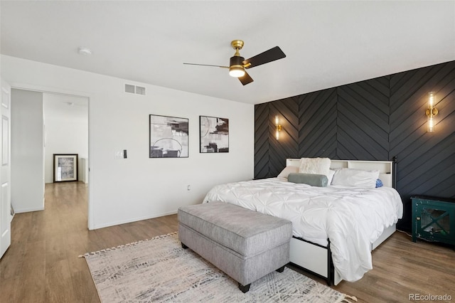 18079 E 108th Pl, Commerce City, CO 80022 - bedroom featuring wood finished floors, baseboards, and ceiling fan