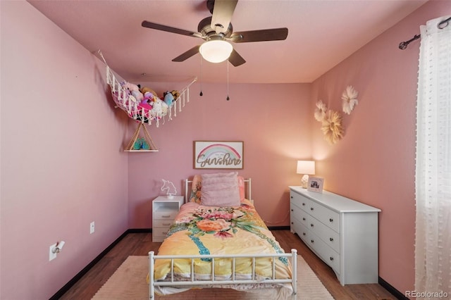 18079 E 108th Pl, Commerce City, CO 80022 - bedroom featuring wood finished floors, ceiling fan, and baseboards