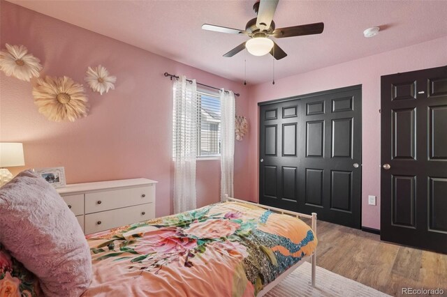 18079 E 108th Pl, Commerce City, CO 80022 - bedroom with wood finished floors and ceiling fan