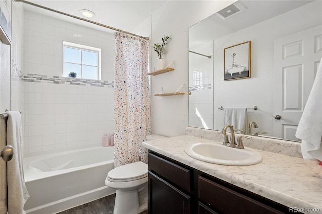 18079 E 108th Pl, Commerce City, CO 80022 - bathroom featuring vanity, shower / bath combo with shower curtain, toilet, and wood finished floors