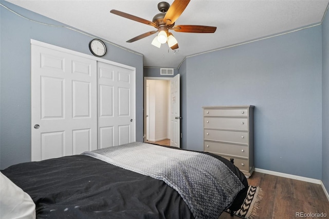 18079 E 108th Pl, Commerce City, CO 80022 - bedroom featuring wood finished floors, a closet, baseboards, and ceiling fan
