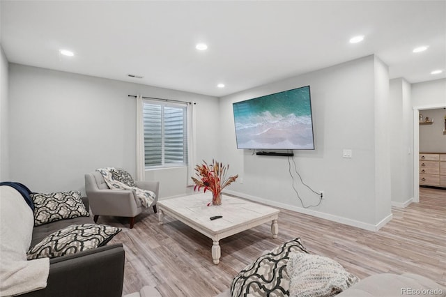 18079 E 108th Pl, Commerce City, CO 80022 - living room with baseboards, light wood finished floors, and recessed lighting