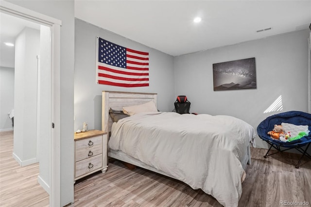 18079 E 108th Pl, Commerce City, CO 80022 - bedroom with wood finished floors, baseboards, and recessed lighting