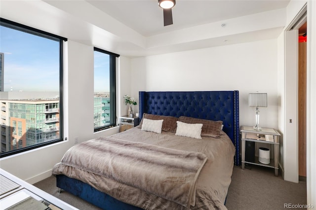 bedroom featuring ceiling fan and carpet flooring