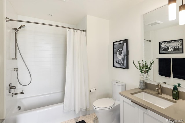 full bathroom featuring vanity, shower / tub combo, and toilet