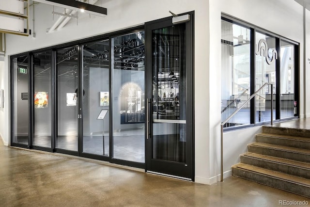 wine cellar featuring concrete flooring