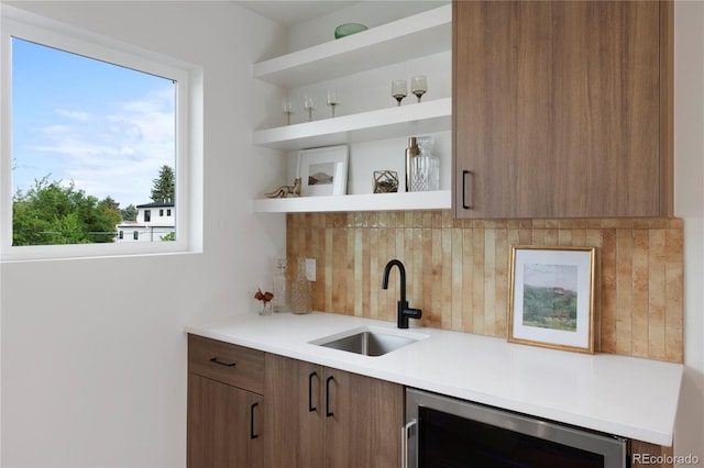 2450 S Cherokee St, Denver, CO 80223 - bar featuring a sink, decorative backsplash, and wine cooler
