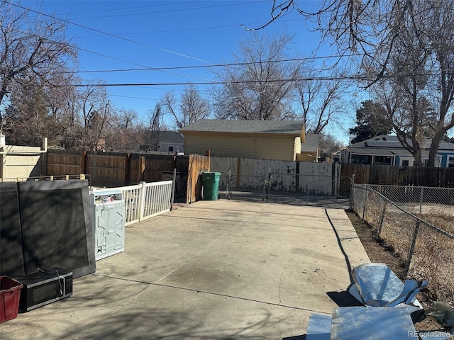 view of yard featuring a patio area and a fenced backyard