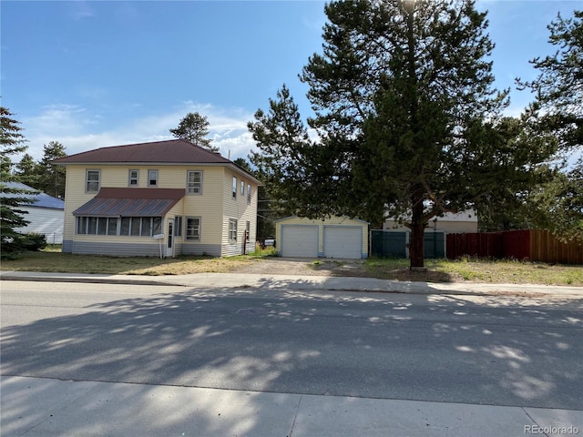 1516 Mount Massive Dr, Leadville, CO 80461 - view of front of property with a garage, an outbuilding, and a metal roof