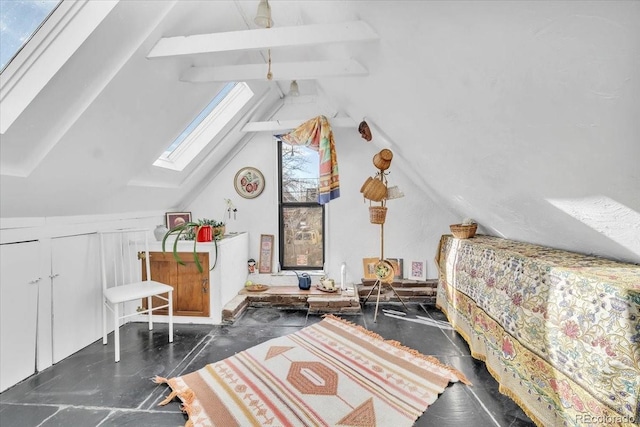 bedroom featuring vaulted ceiling with skylight