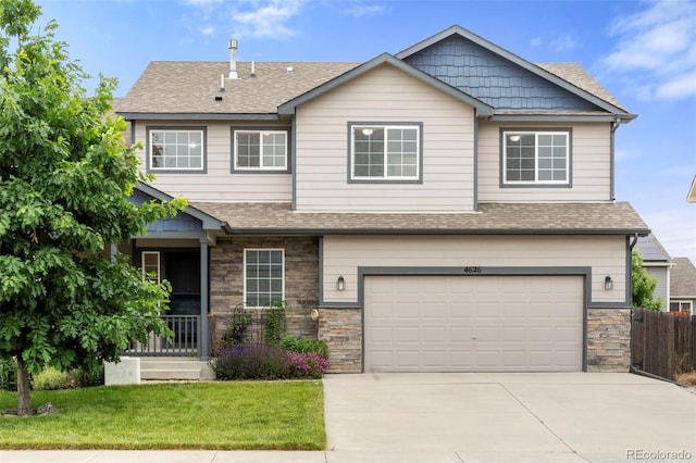 4626 Dancing Rain Way, Colorado Springs, CO 80911 - craftsman-style home with concrete driveway, a garage, roof with shingles, and stone siding