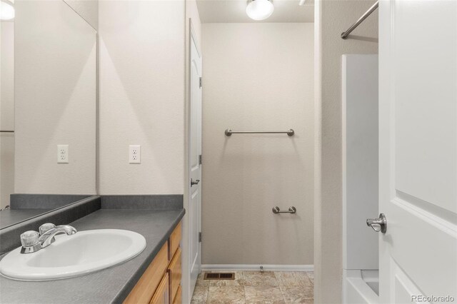 4626 Dancing Rain Way, Colorado Springs, CO 80911 - bathroom with vanity and baseboards