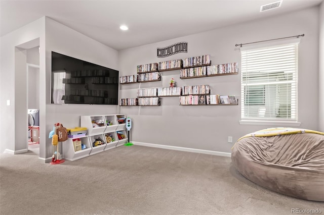 6990 E 132nd Pl, Thornton, CO 80602 - recreation room with carpet and baseboards