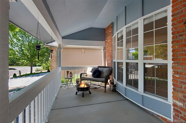 7773 Gunsight Pass, Littleton, CO 80127 - balcony featuring an outdoor fire pit